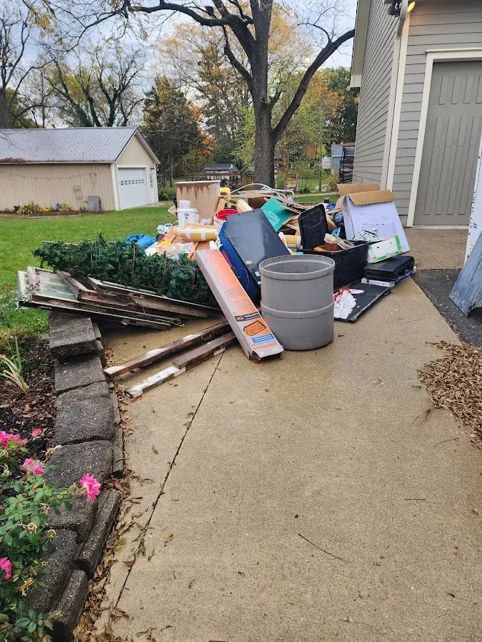 Dumpster being loaded with debris for Demolition Dumpster Rental in Annville
